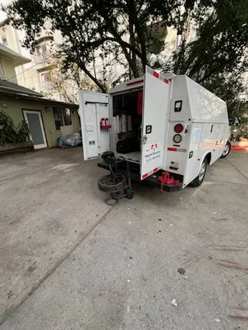 Magnet Plumbing service vehicle on-site for Grease Trap Cleaning in Vero Beach